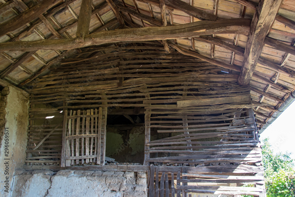 Details of an old wooden house, wooden barn structure, rural scene, interior of an abandoned house