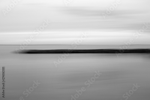 Abstract monochrome november lake in blurred motion