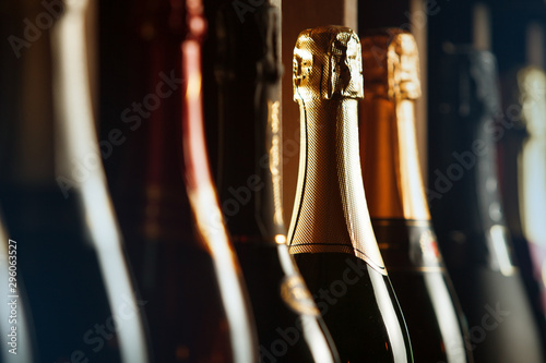 Принти на полотні Underground cellar with elite sparkling wine on shelves, close up horizontal photo