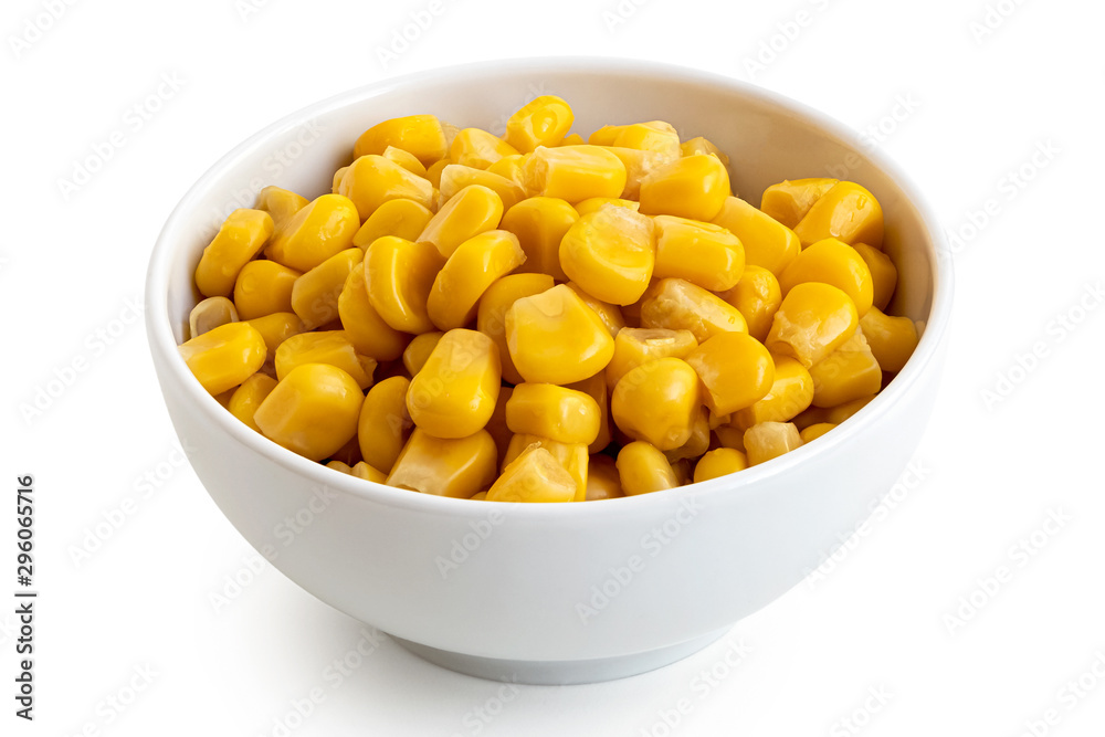 Canned sweet corn in a white ceramic bowl isolated on white. Canned sweet corn in a white ceramic bowl isolated on white.