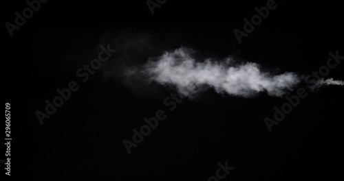 Real white smoke isolated on black background with visible droplets