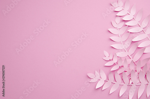 Origami exotic paper plants on pink background