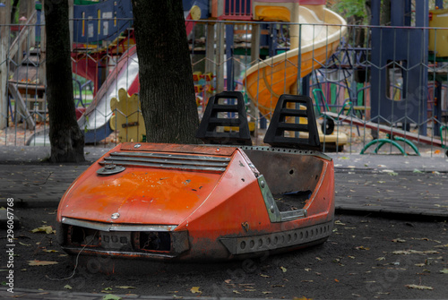 Old abandoned attraction. Bumper car.