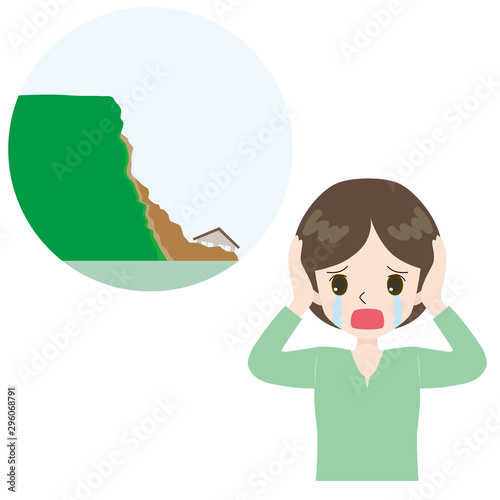 崖崩れ　嘆く女性