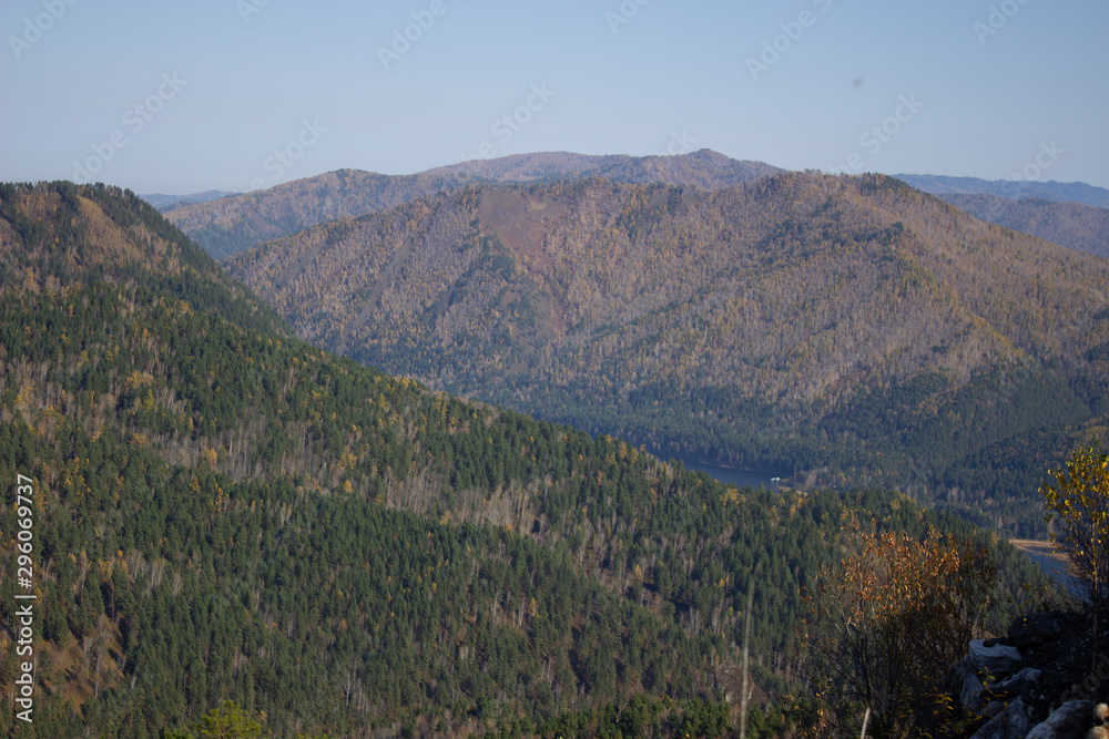 Fototapeta premium Big forest mountain valley from above. Hiking in the mountains