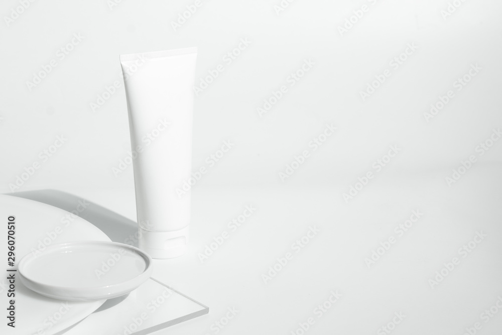 fresh beauty spa medical skincare and cosmetic lotion cream facial tube bottle packaging product on white decor background with summer season sun light fresh beauty spa medical skincare and cosmetic lotion cream facial tube bottle packaging product on white decor background with summer season sun light