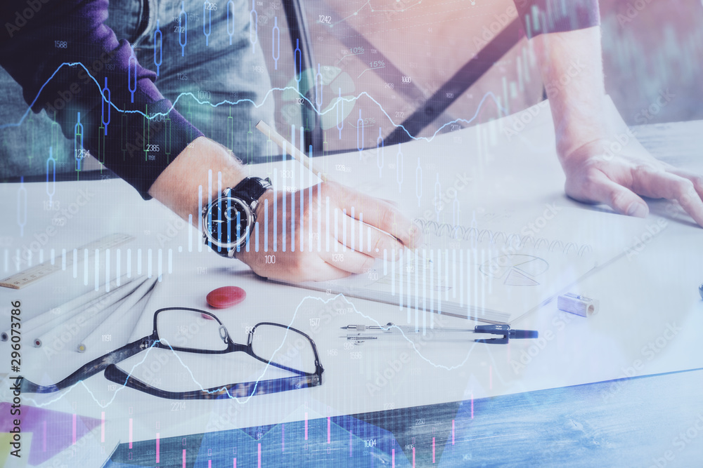Multi exposure of man standing and planing investment with stock market forex chart. Multi exposure of man standing and planing investment with stock market forex chart.