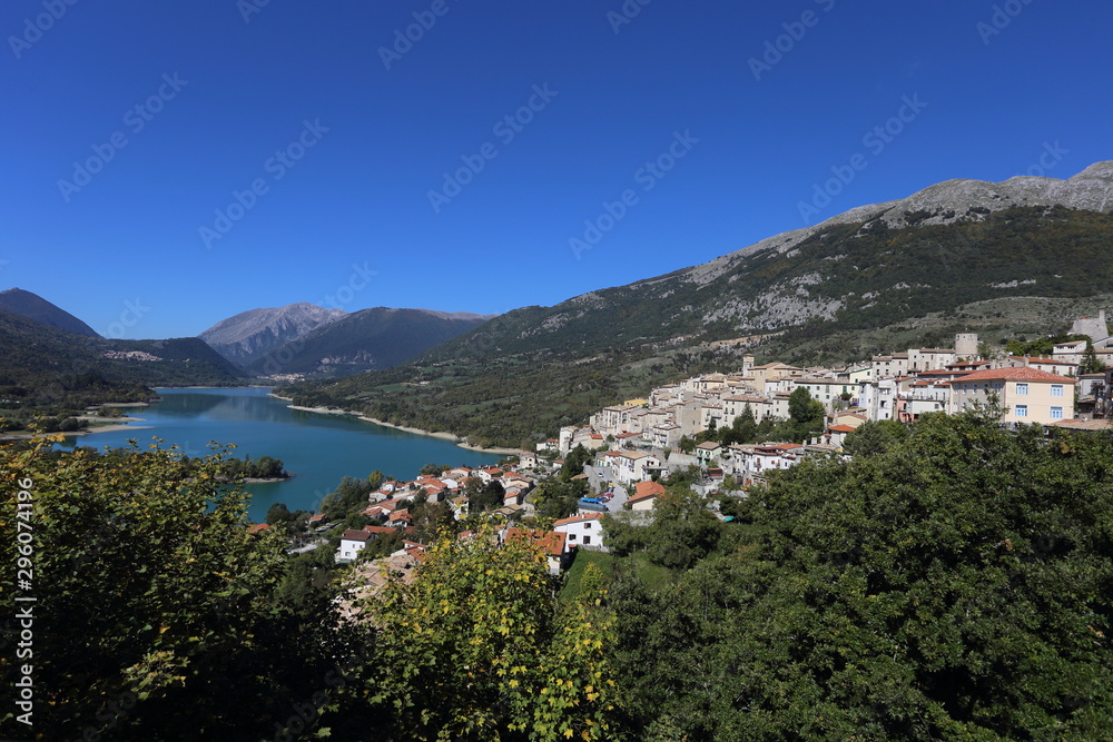 Fototapeta premium Barrea, Italy - 12 October 2019: Lake Barrea and the mountain village