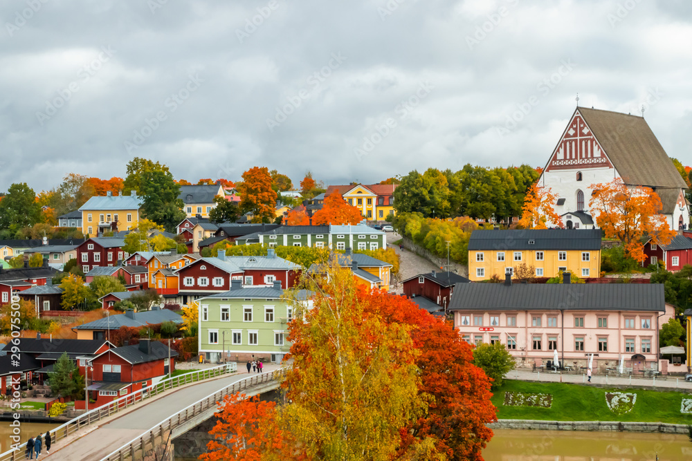 View of old Porvoo, Finland. Beautiful city autumn landscape with Porvoo Cathedral and colorful wooden buildings.
