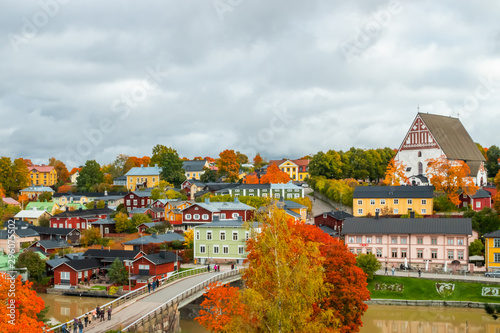View of old Porvoo, Finland. Beautiful city autumn landscape with Porvoo Cathedral and colorful wooden buildings.