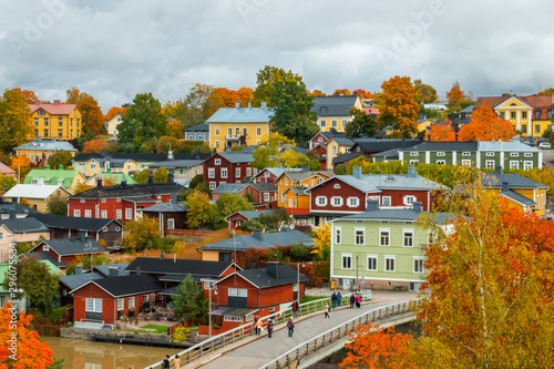 View of old Porvoo, Finland. Beautiful city autumn landscape with colorful wooden buildings. photo