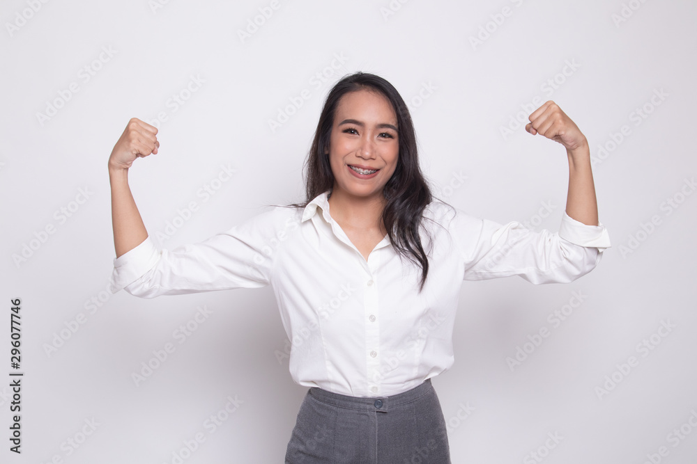 Beautiful young Asian woman flex bicep. Beautiful young Asian woman flex bicep.
