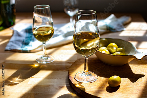 Obraz na płótnie Sherry wine tasting, dry fino, manzanilla or palomino jerez fortified wine in gl