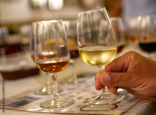 Sherry wine tasting, selection of different jerez fortified wines from dry to very sweet in glasses, Jerez de la Frontera, Andalusia, Spain photo