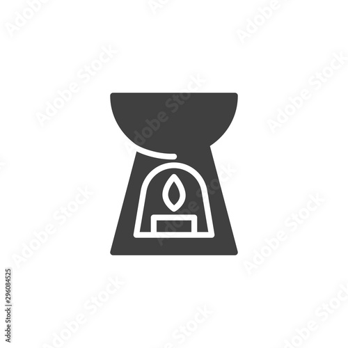 Aromatherapy lamp vector icon. filled flat sign for mobile concept and web design. Spa lamp with aroma candle glyph icon. Symbol, logo illustration. Vector graphics