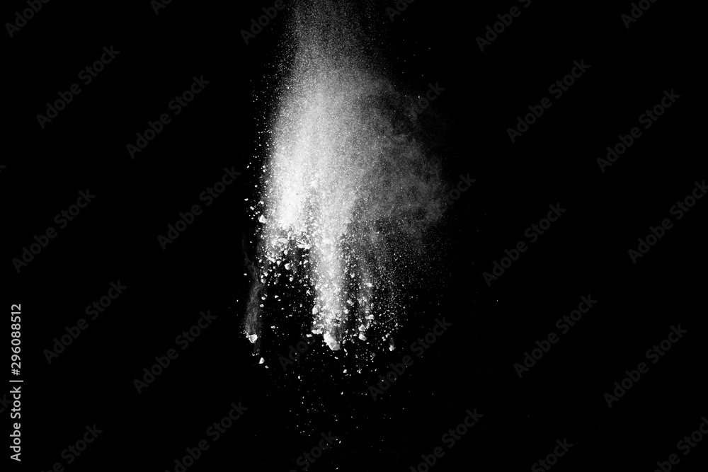 White powder explosion on black background. White powder explosion on black background.