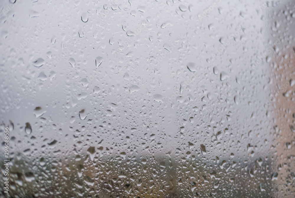 Rainy autumn day, drops on the window. Background with water drops Rainy autumn day, drops on the window. Background with water drops