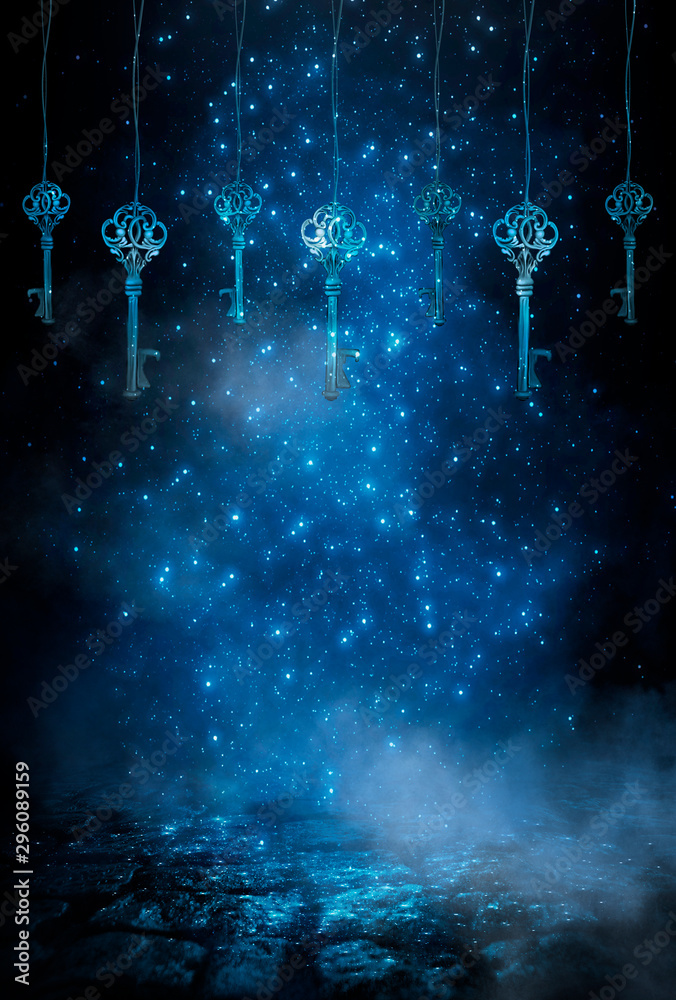 Dark night magic scene with a garland of old keys. Night view, smoke