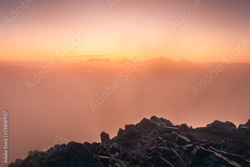 Colorful foggy sunrise over the mountains in High Tatras, Slovakia