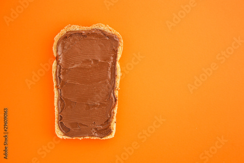 Fototapeta Naklejka Na Ścianę i Meble -  chocolate nut butter sandwich (delicious snack, bread or toast and nut butter, paste, classic combination of taste, Italian cuisine) menu concept. food background. copy space. Top view