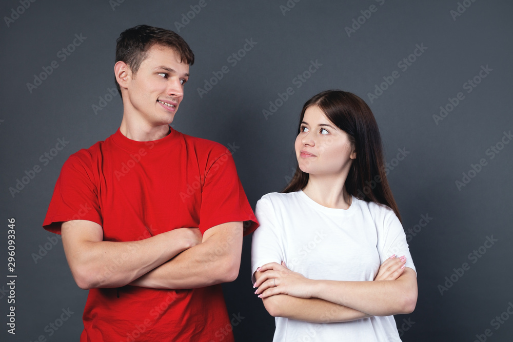 guy and girl look at each other guy and girl look at each other