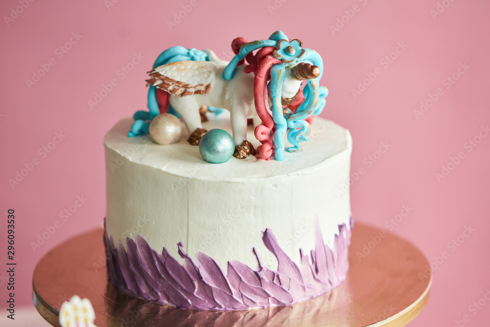 home made yummy cake cooked for birthday party, dessert on sale, discount. isolated pink background home made yummy cake cooked for birthday party, dessert on sale, discount. isolated pink background