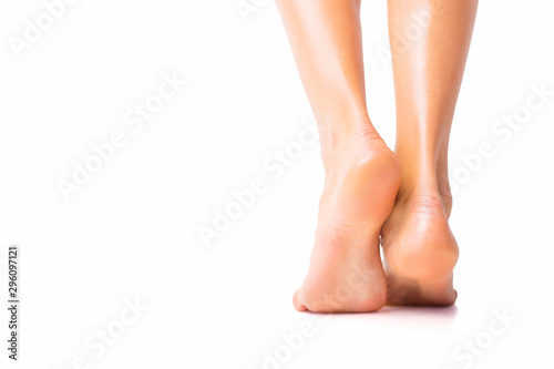 Woman with bare foot standing