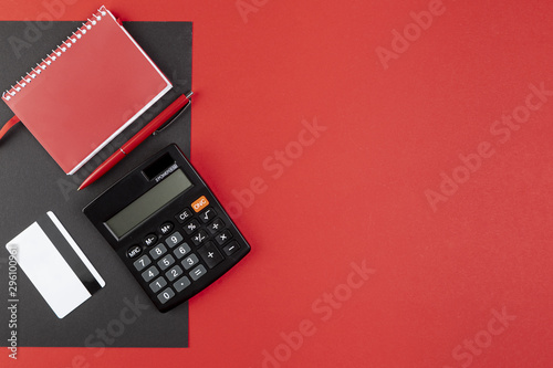 Desk stuff on red background with copy space