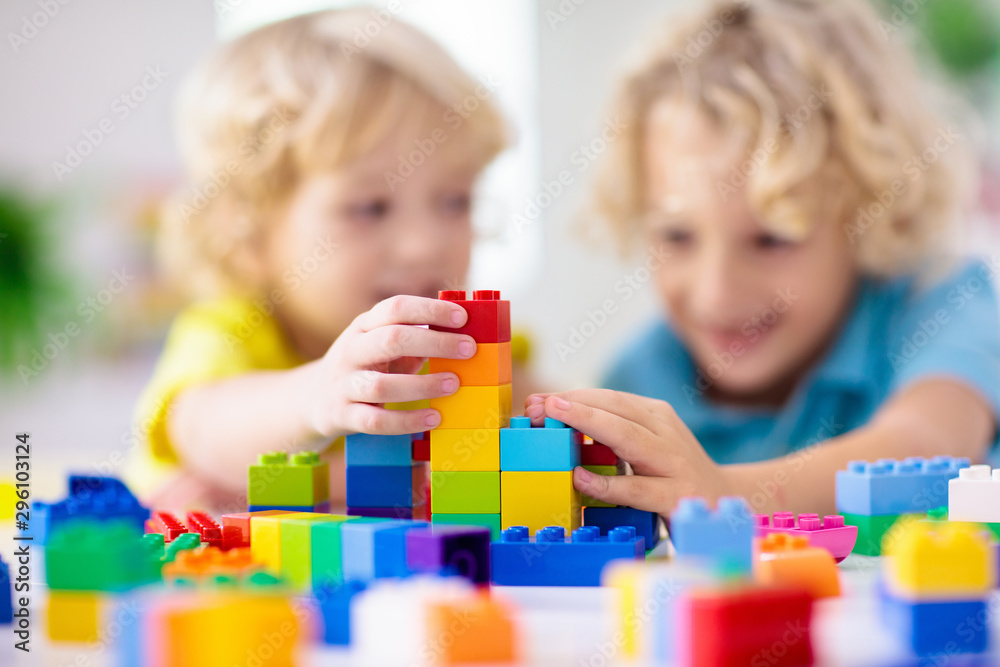 Child playing with toy blocks. Toys for kids. Child playing with toy blocks. Toys for kids.