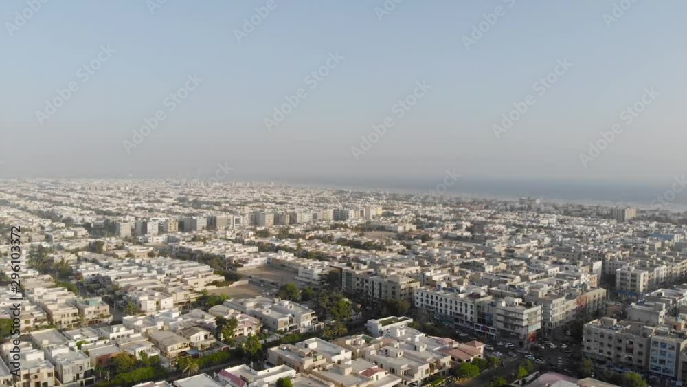 Top Aerial View Of Karachi City With Lots Of Housing And Roads And City Views - Moving Down Top Aerial View Of Karachi City With Lots Of Housing And Roads And City Views - Moving Down