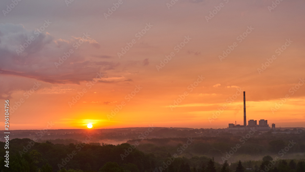 Rounded sun and factory 