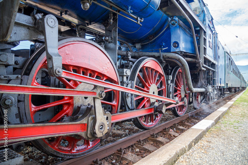 Historic train, detail of steam locomotive wheels.