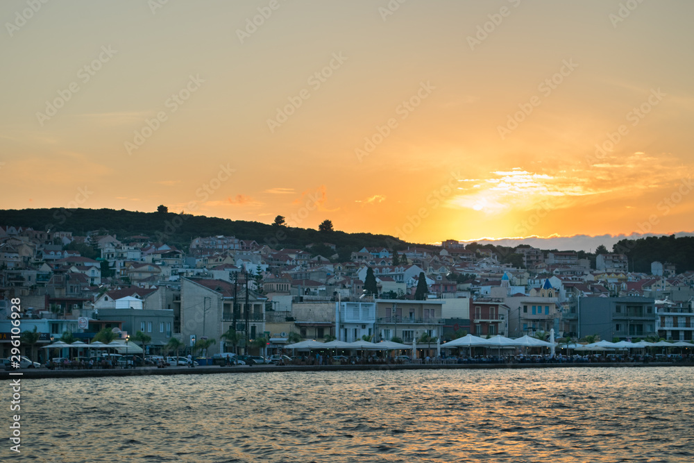 Sunset view of Argostoli city in Kefalonia Greece. View of the port and the traditional houses