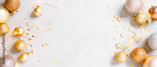 Christmas festive banner with golden christmas decoranion and lights