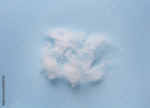 Siliconized hollowfiber, polyester fiber on a blue background, used as a filler for blankets, pillows, clothes