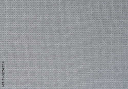 Grey bath towel waffle texture background