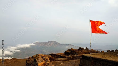 flag on top of mountain Rajgad forth photo