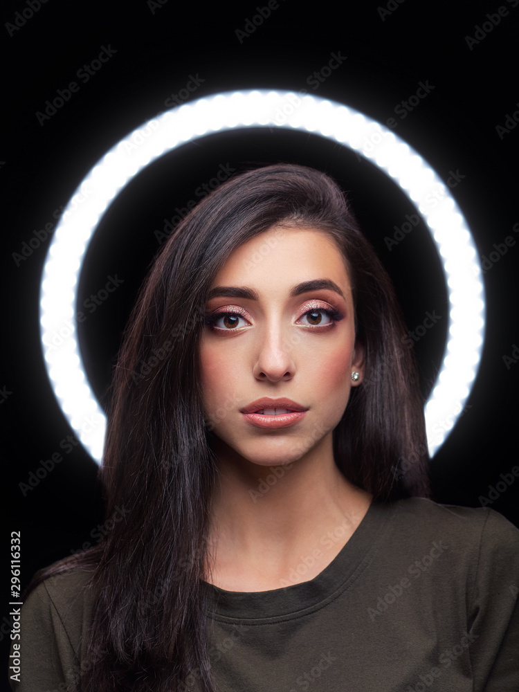 Beautiful young caucasian woman trendy look portrait with ring light halo background makeup artist portfolio in film effect colors Stock Photo | Adobe Stock