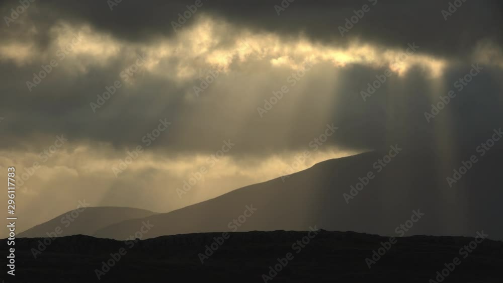 Light beams through mountain storm clouds Iceland.mov Light beams through mountain storm clouds Iceland.mov