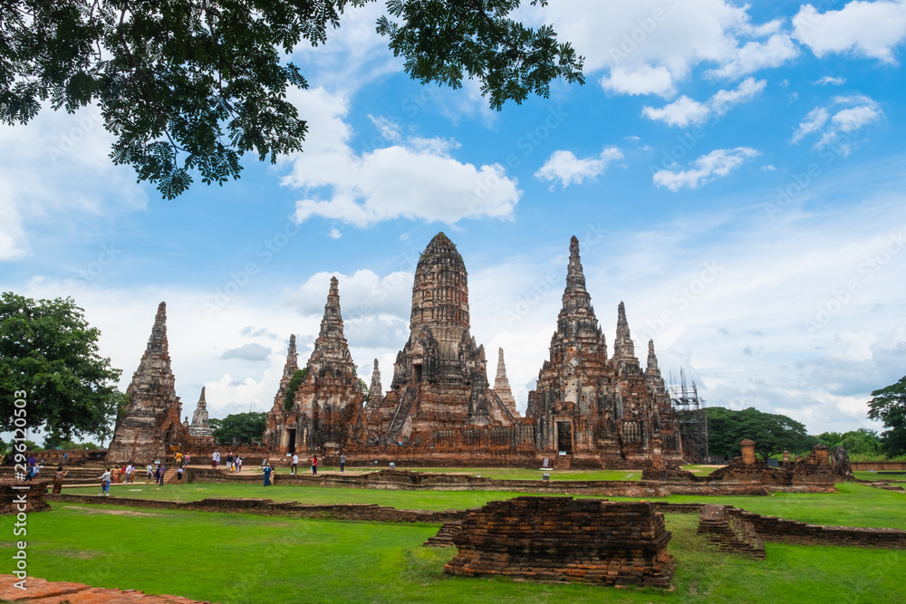 Fototapeta premium Wat Chaiwatthanaram is an old temple in the Ayutthaya period. There are people walking the ruins and ancient traces.