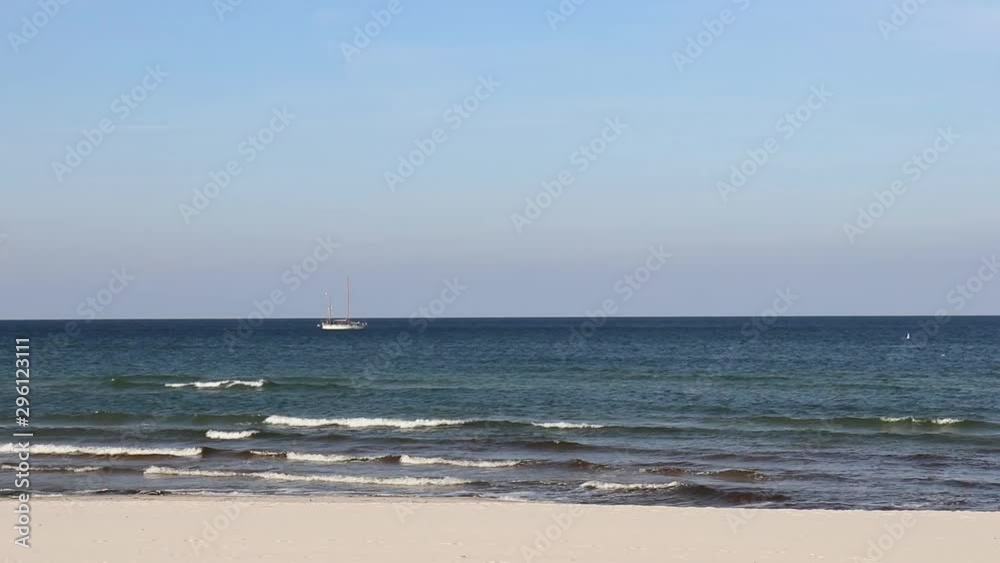 white yacht moving along the sea along the coast white yacht moving along the sea along the coast