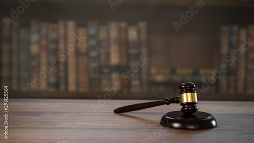Law and Justice concept. Mallet of the judge, books, scales of justice. Courtroom theme. photo
