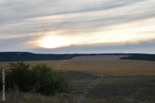 Sunset in fields in autumn