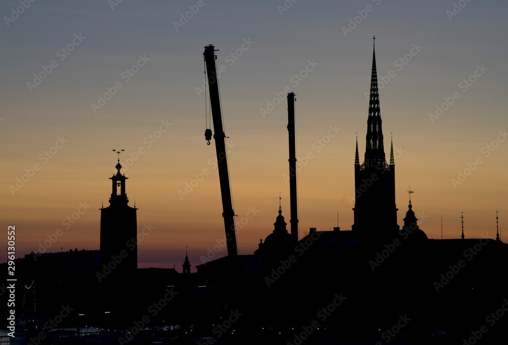 Sunset in Stockholm, with views of historical buildings in silhouette