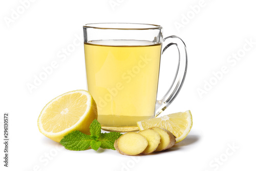 cup of hot tea with ginger, lemon and mint isolated on a white background
