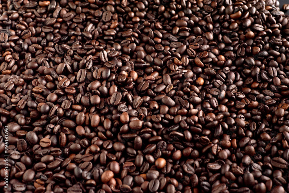 Roasted coffee beans background, arabica and robusta. Roasted coffee beans background, arabica and robusta.