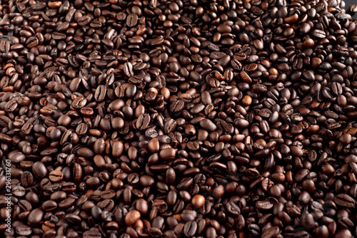 Roasted coffee beans background  arabica and robusta.