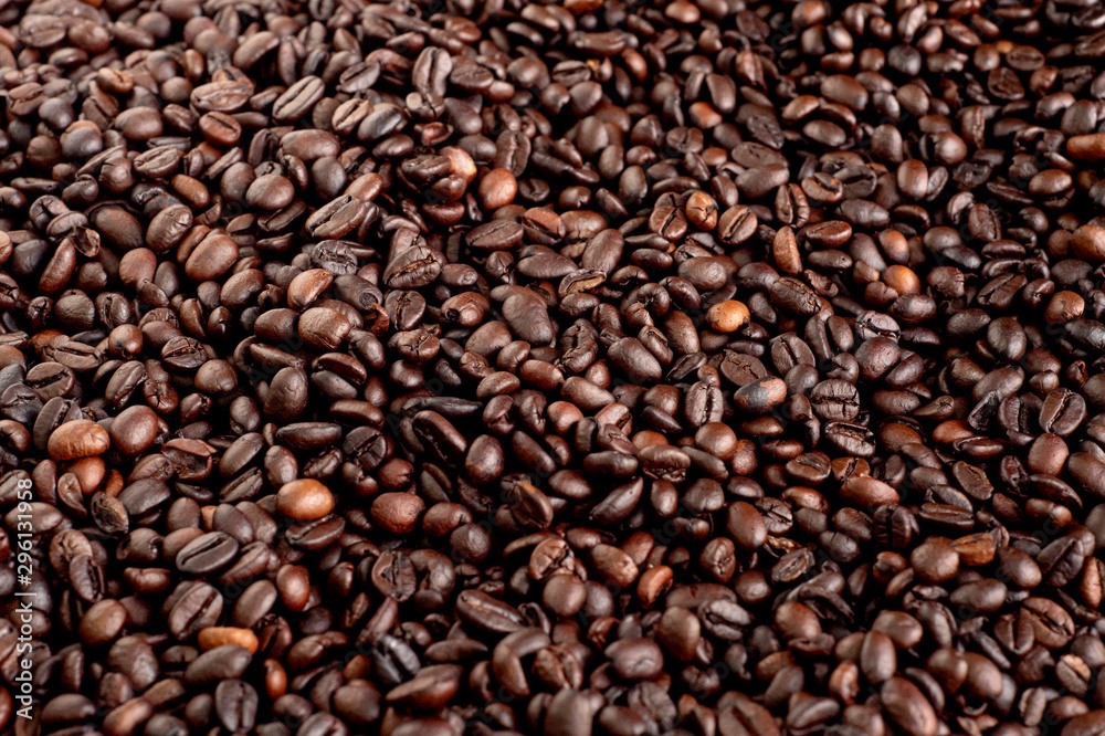 Roasted coffee beans background, arabica and robusta. Roasted coffee beans background, arabica and robusta.