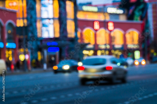 Abstract blurred background of evening city.Night traffic,colorful lights