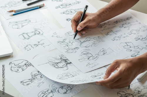 Schilderij op canvas Animator designer Development designing drawing sketching development creating graphic pose characters sci-fi robot Cartoon illustration animation video game film production , animation design studio
